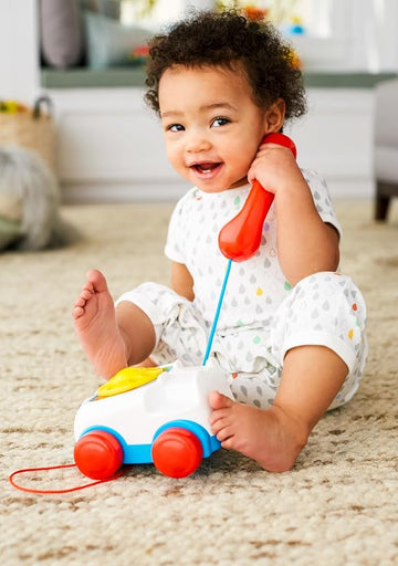Fisher-Price Toddler Pull Toy Chatter Telephone Pretend Phone with Rotary Dial and Wheels for Walking Play Ages 1+ years, FGW66