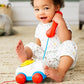 Fisher-Price Toddler Pull Toy Chatter Telephone Pretend Phone with Rotary Dial and Wheels for Walking Play Ages 1+ years, FGW66